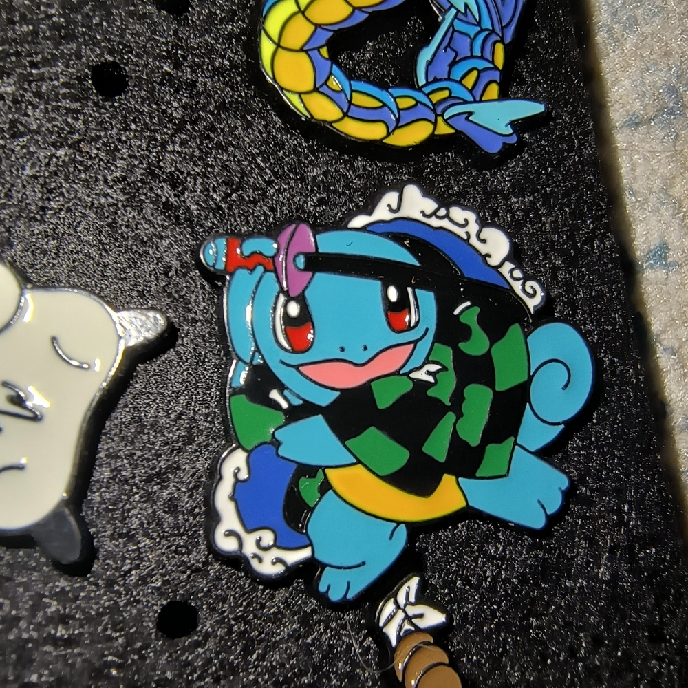Pokemon Squirtle Enamel Pin in Blue with Green Checkered Cloak and Yellow Belt